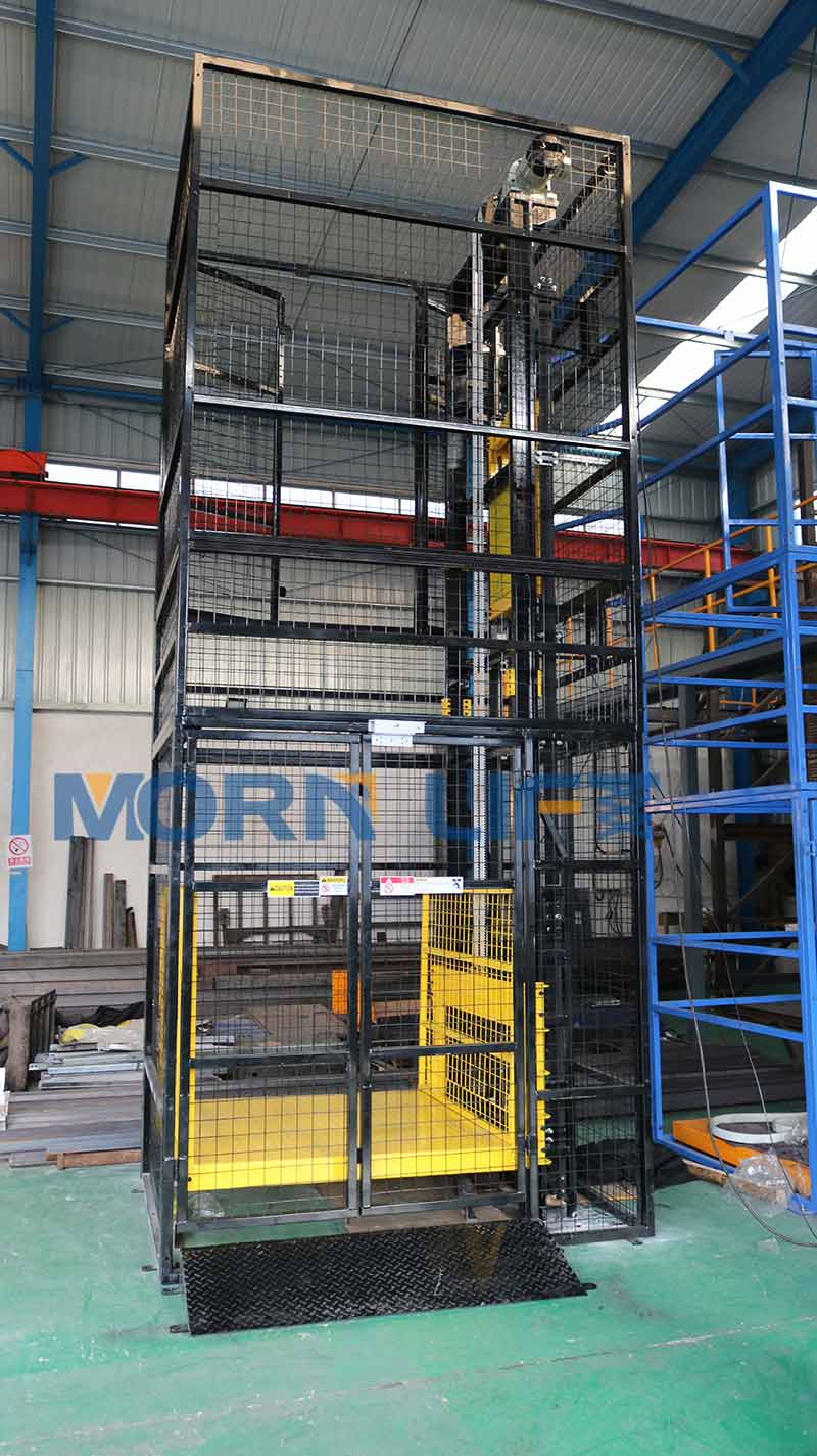 freight elevator with steel mesh enclosure